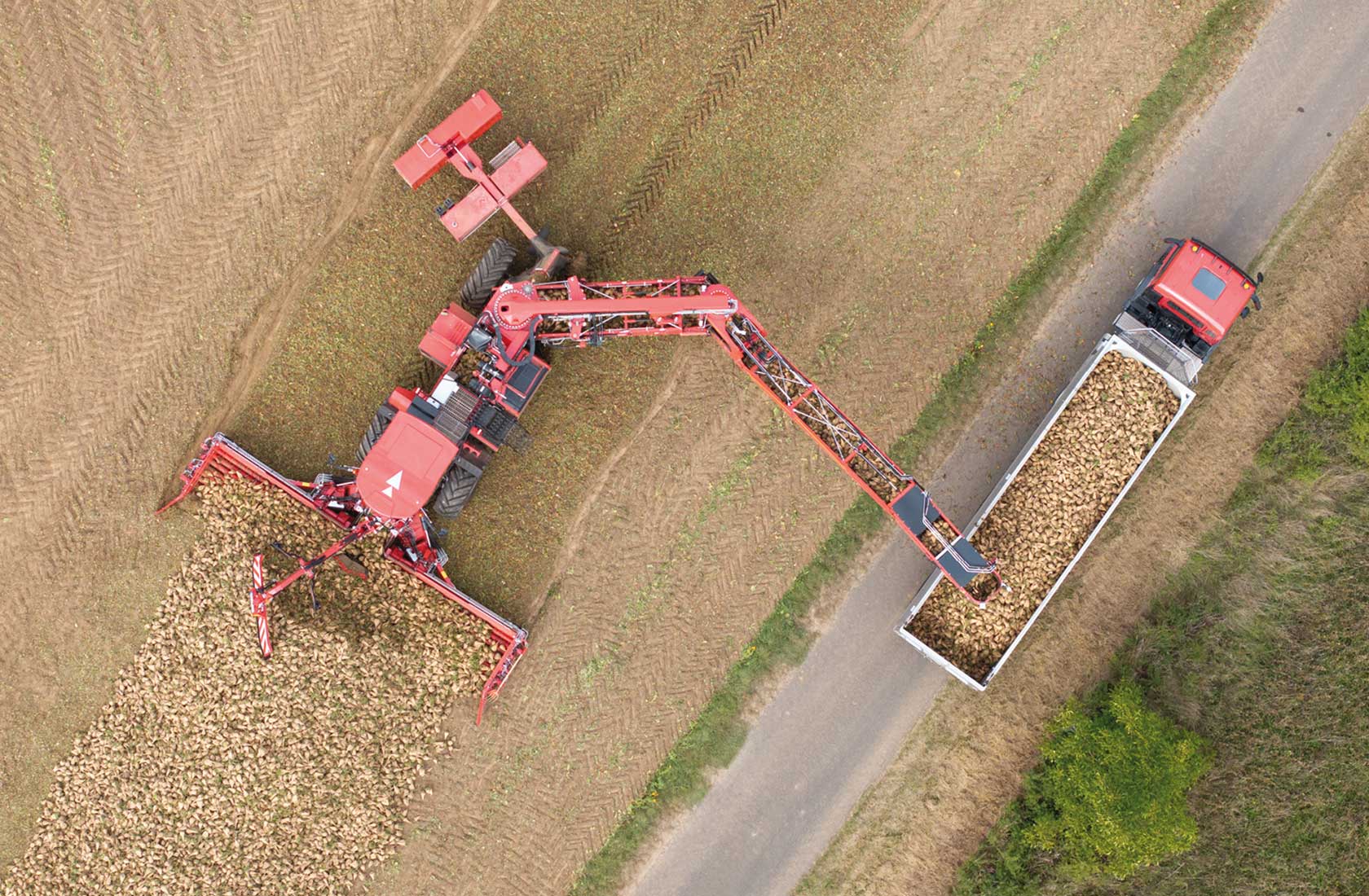 Pick-up, cleaning, and transfer loading - Holmer Maschinenbau GmbH